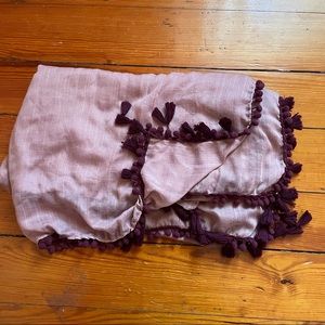 Pink and burgundy scarf with pom-pom detail
